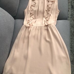 Peach colored ruffle detail dress